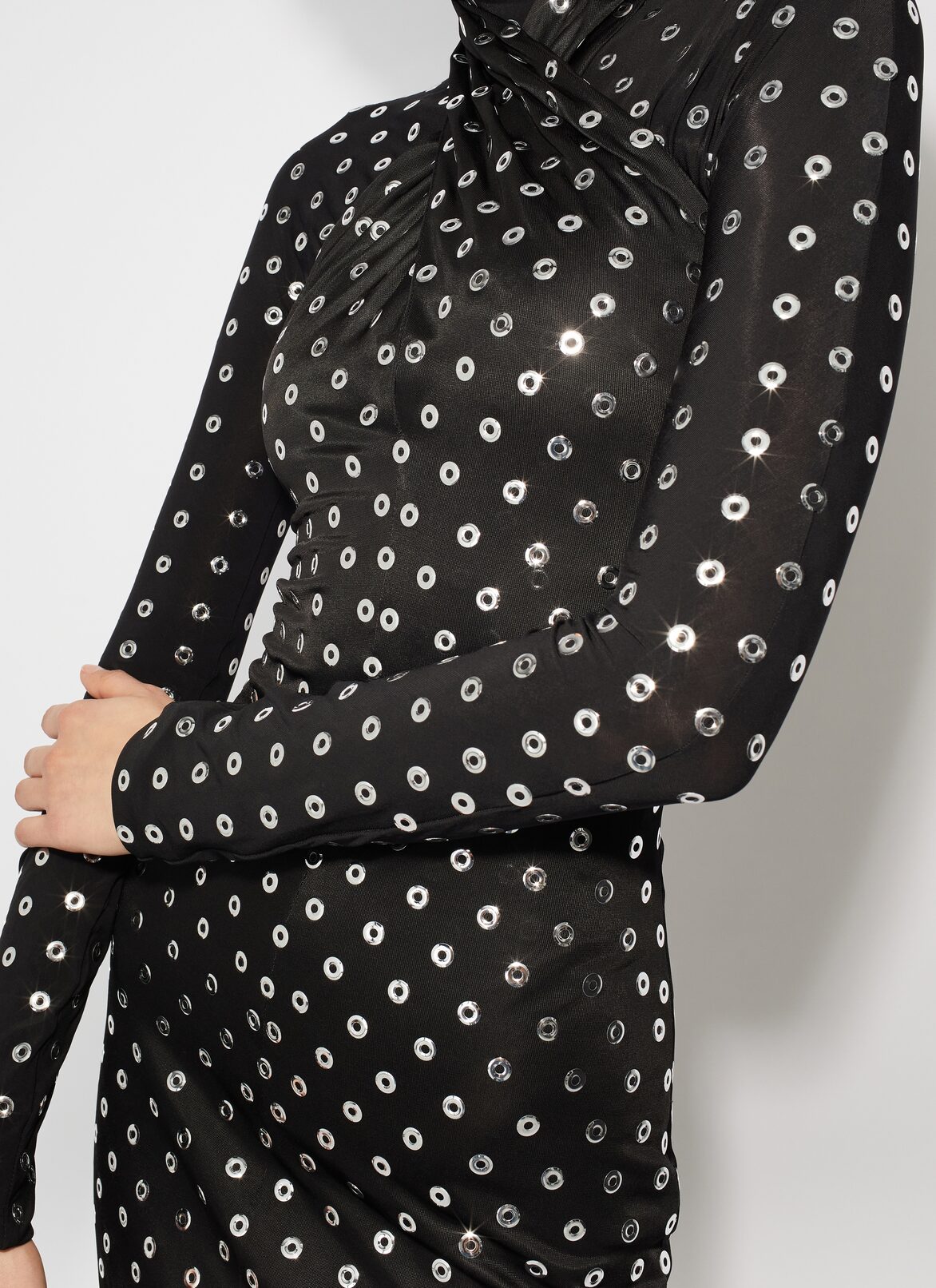 Fluid eyelet jersey dress ALAÏA BLACK FLUID EYELET JERSEY DRESS
